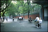Cycling past the front gate ::  :: Kong Miao--The Confucius Temple :: Beijing, China