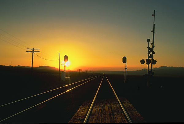 Rail Crossing<br>Nearing Ludlow, California: The Mojave Desert, California, United States of America
: Landscapes; Engineering Feats.