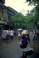 Rain quiets the busy streets :: Hanoi, Vietnam
